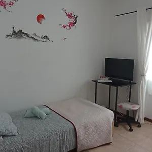 Quarto em Acomodações Particulares Casa Tílias